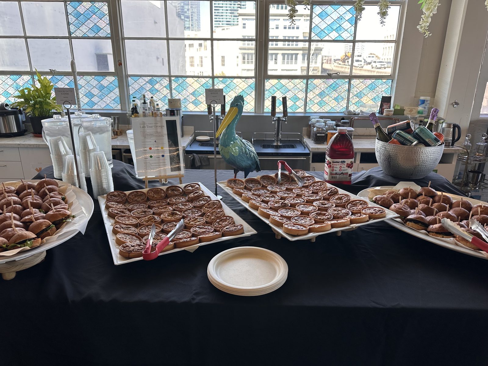 Food spread with Lab Tour Groups sign