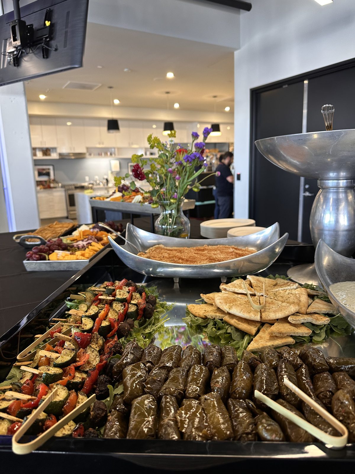 Dolmas, pita, and grilled vegetable skewers