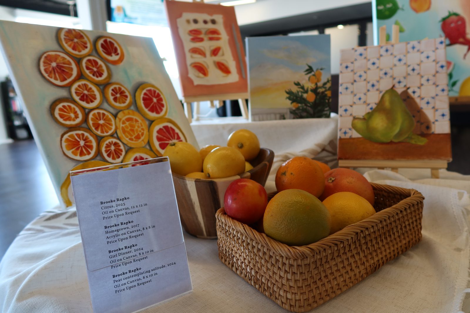 Brooke Rapko, citrus paintings table display
