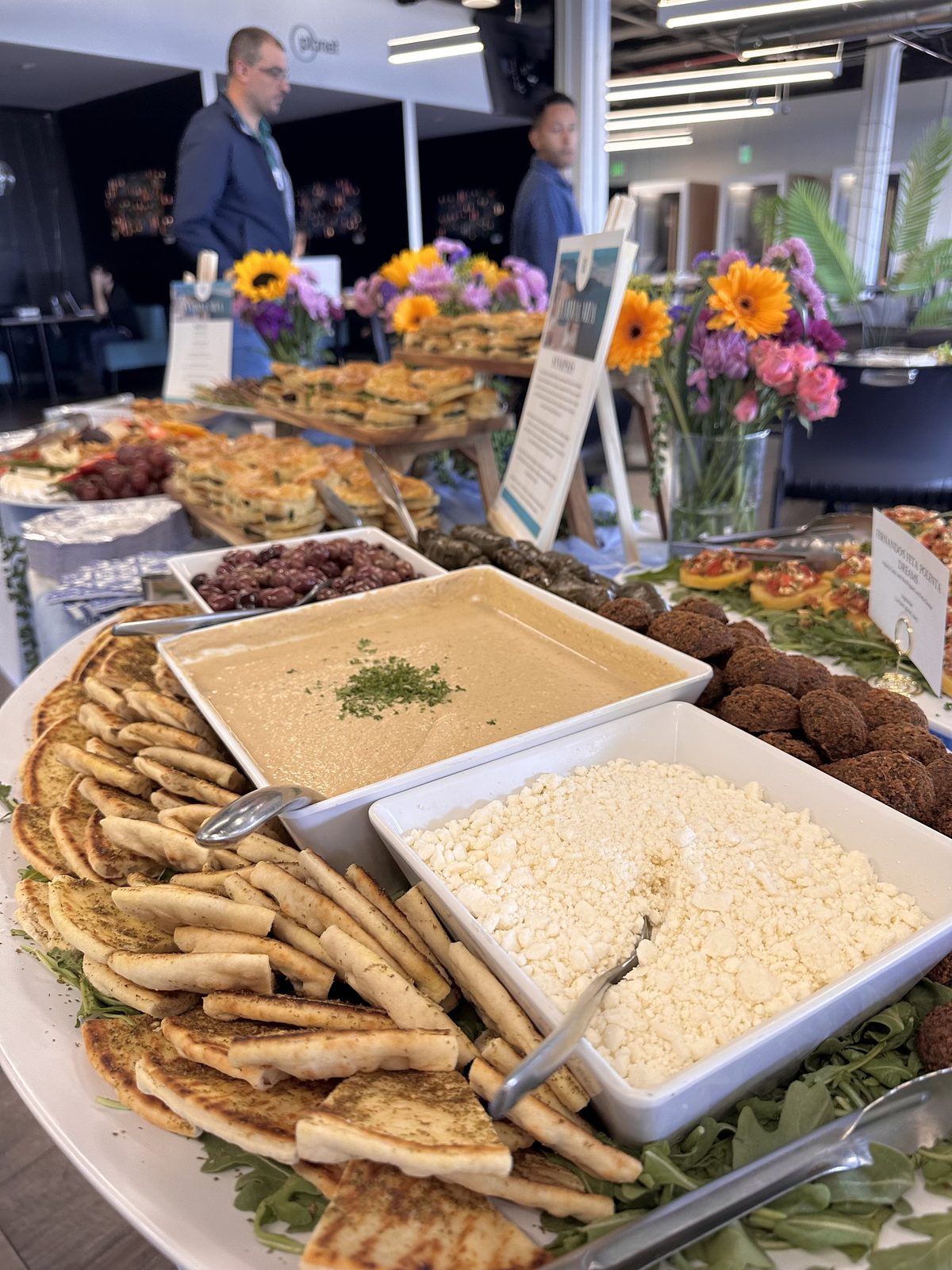 Mediterranean platter with pita, hummus, feta, and falafel