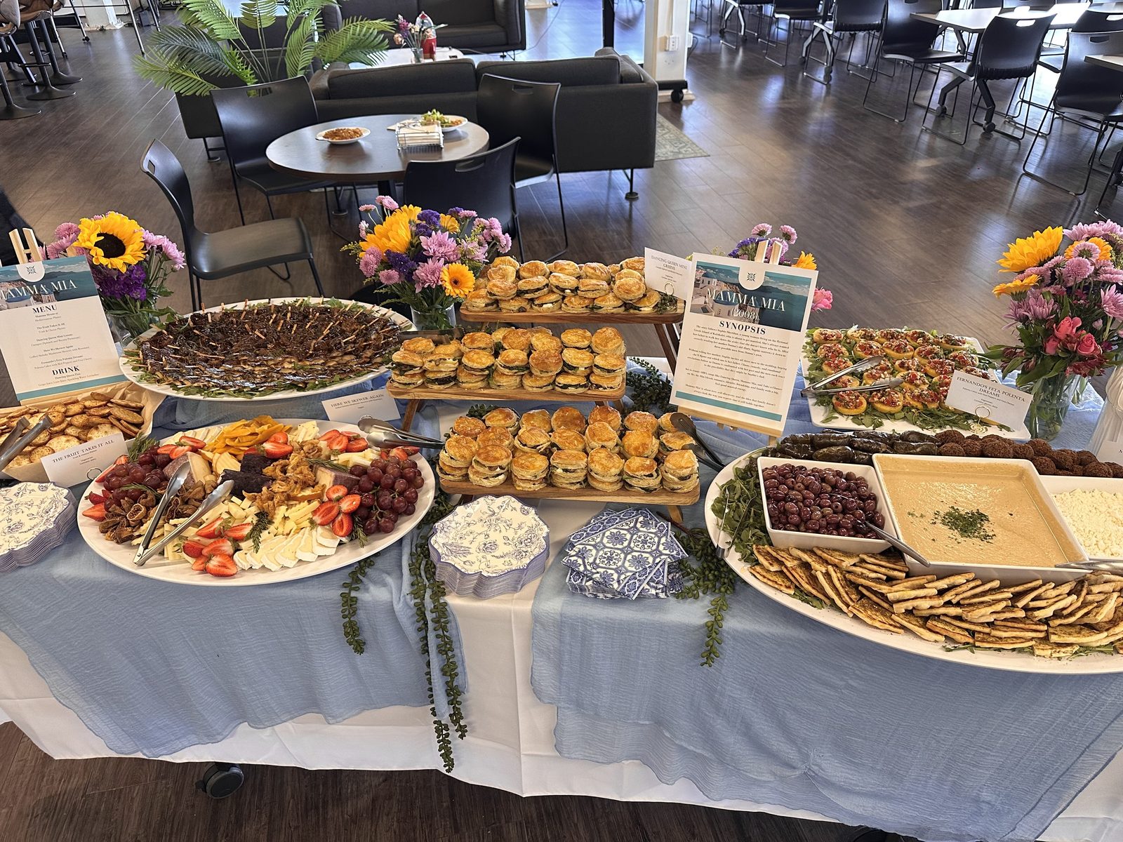 Mamma Mia themed spread with menu and synopsis cards