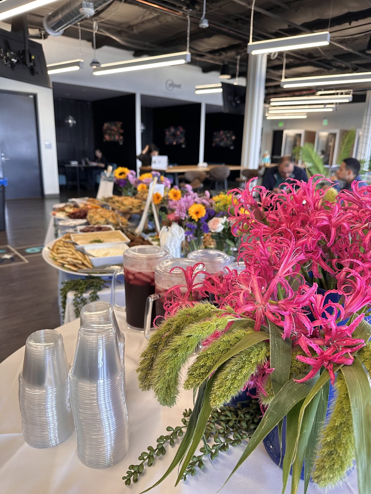 Table spread with florals and drink station