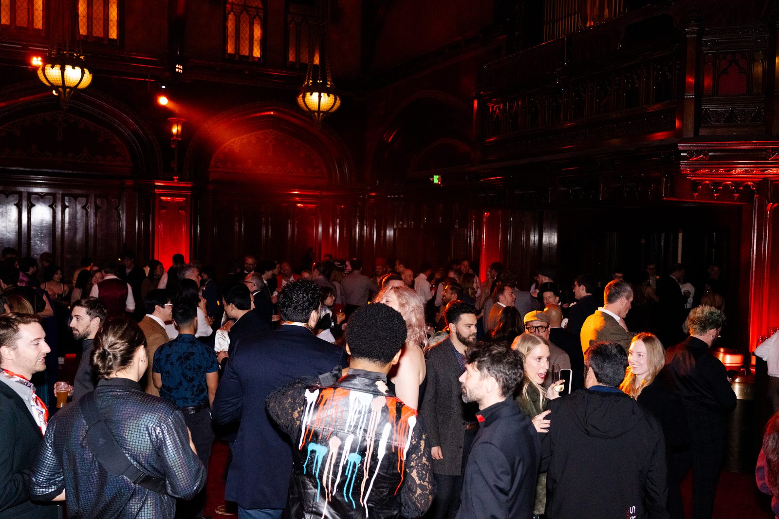 Guests mingling on the ballroom floor