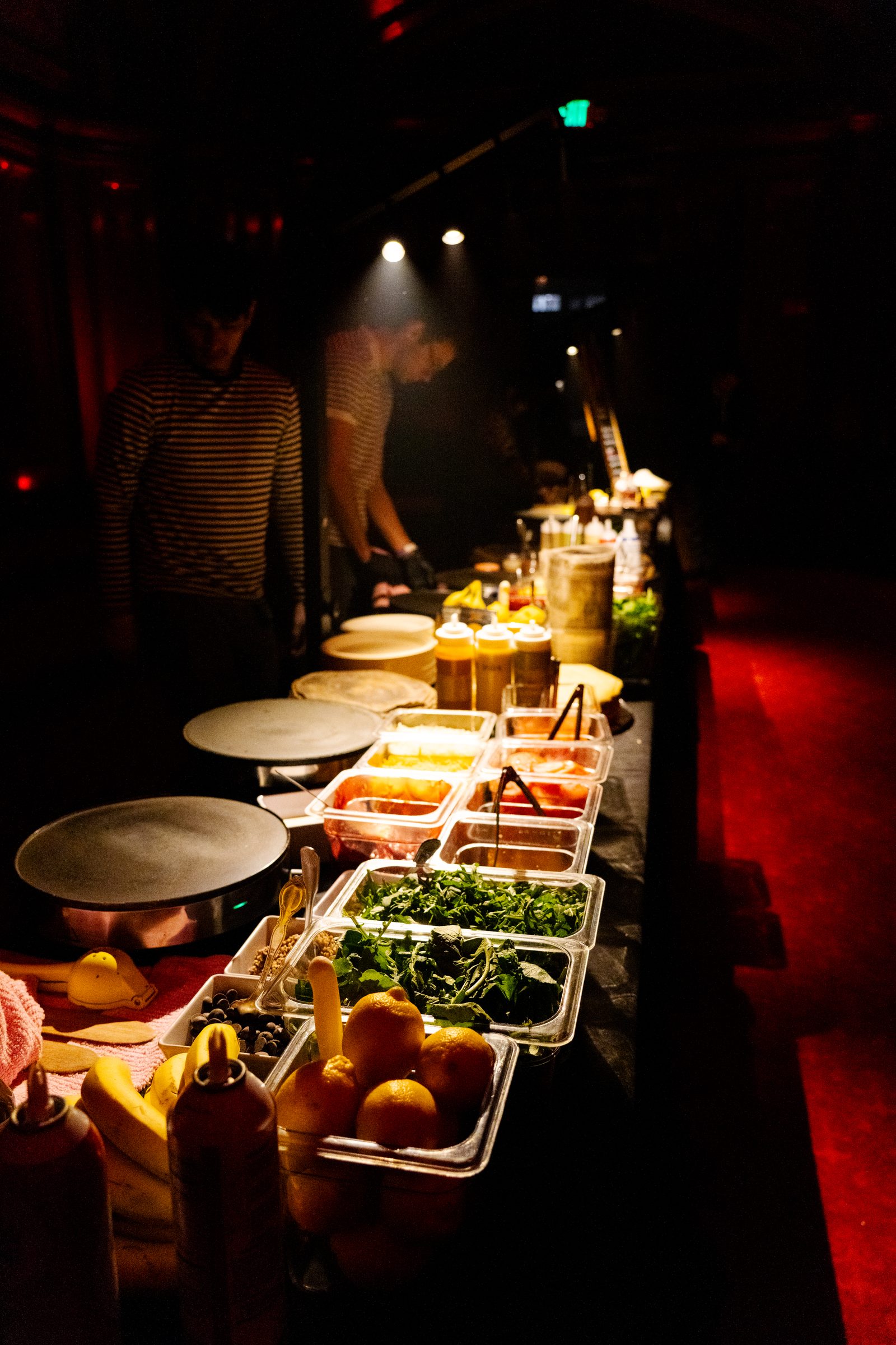 Crepe toppings bar with fresh fruit and greens