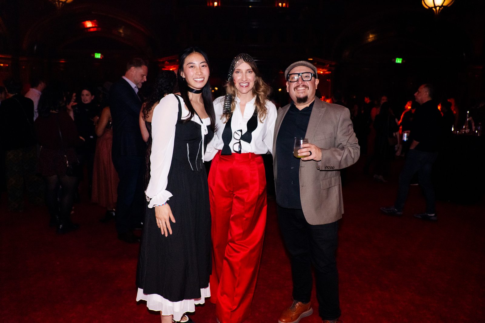 Guests posing together at the party