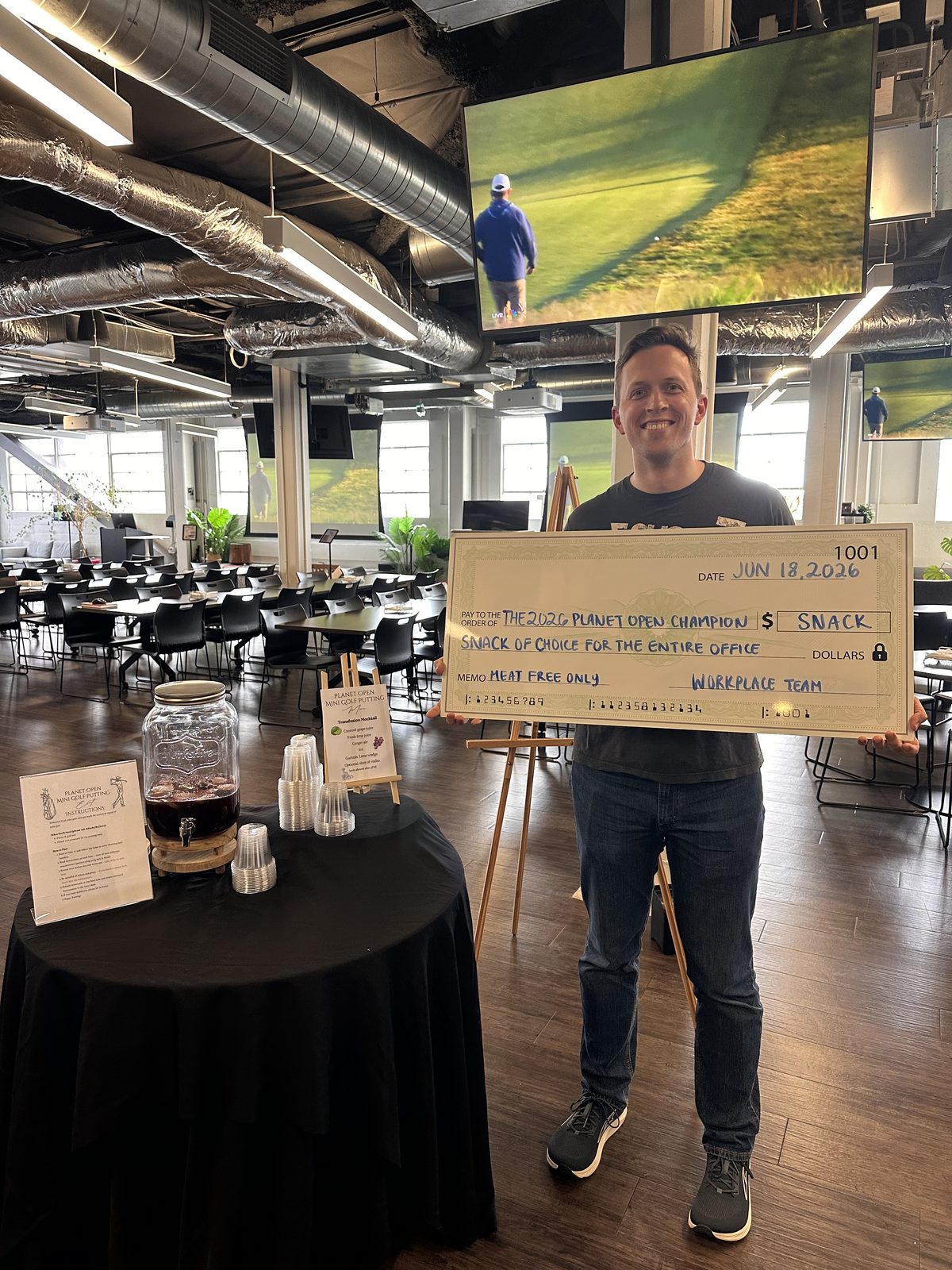 2026 Planet Open champion with the winner's check